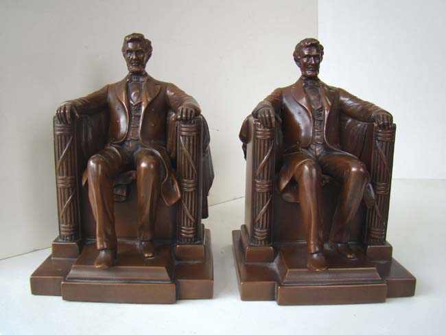Absolutely the finest pair of Jennings Brothers "Lincoln in the chair" bookends circa 1925